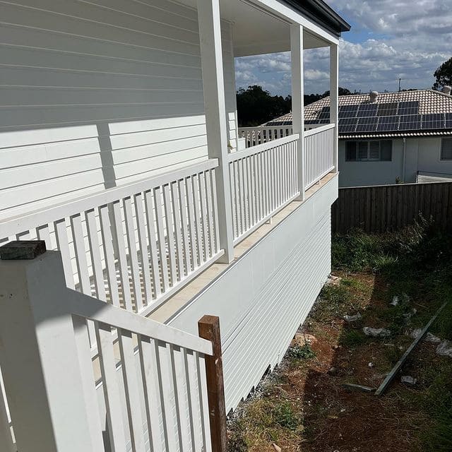 Exterior cladding and screening on a raised home
